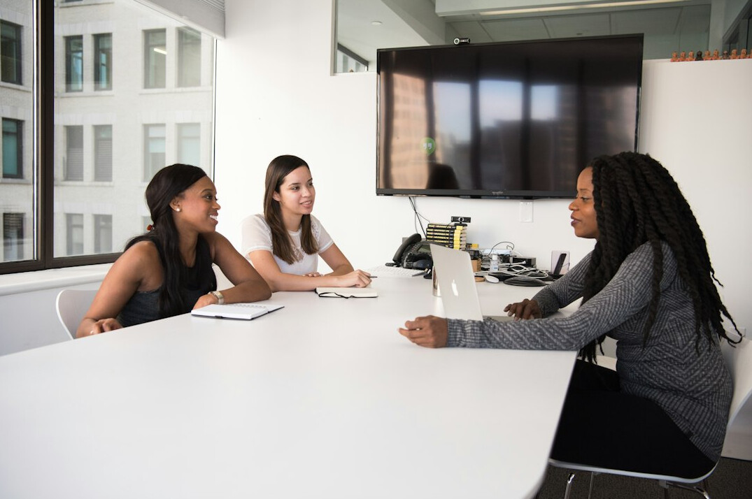 diverse group discussing topics